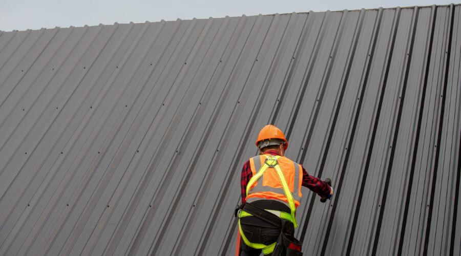 Professional metal roof installation services in Long Island, KS